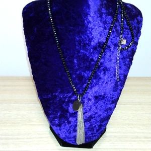 Banana republic shiny black beads with silvertone tassel and disk long